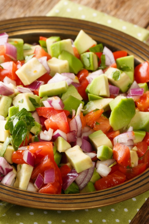 avocado in tomato cucumber onion salad