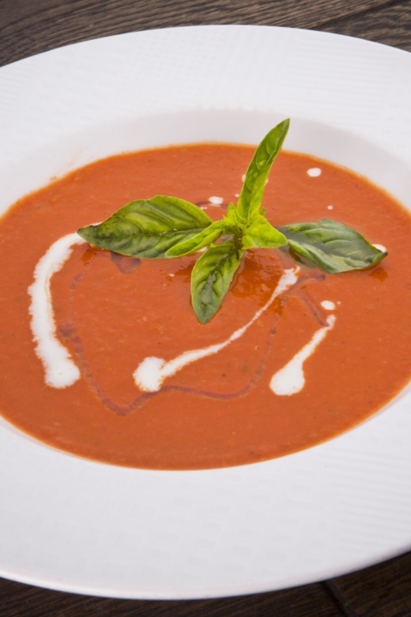 bowl of tomato bisque with basil 